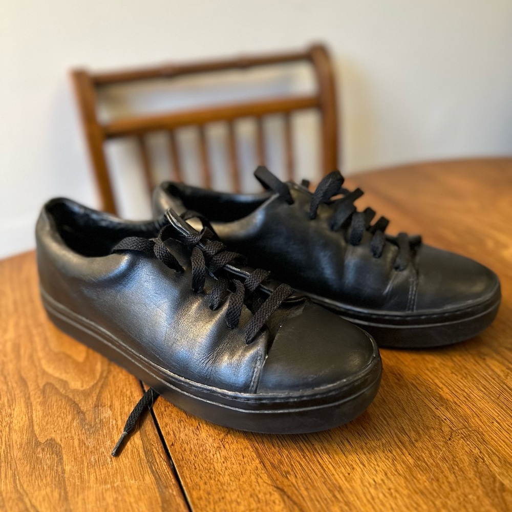 COS brand black leather sneakers